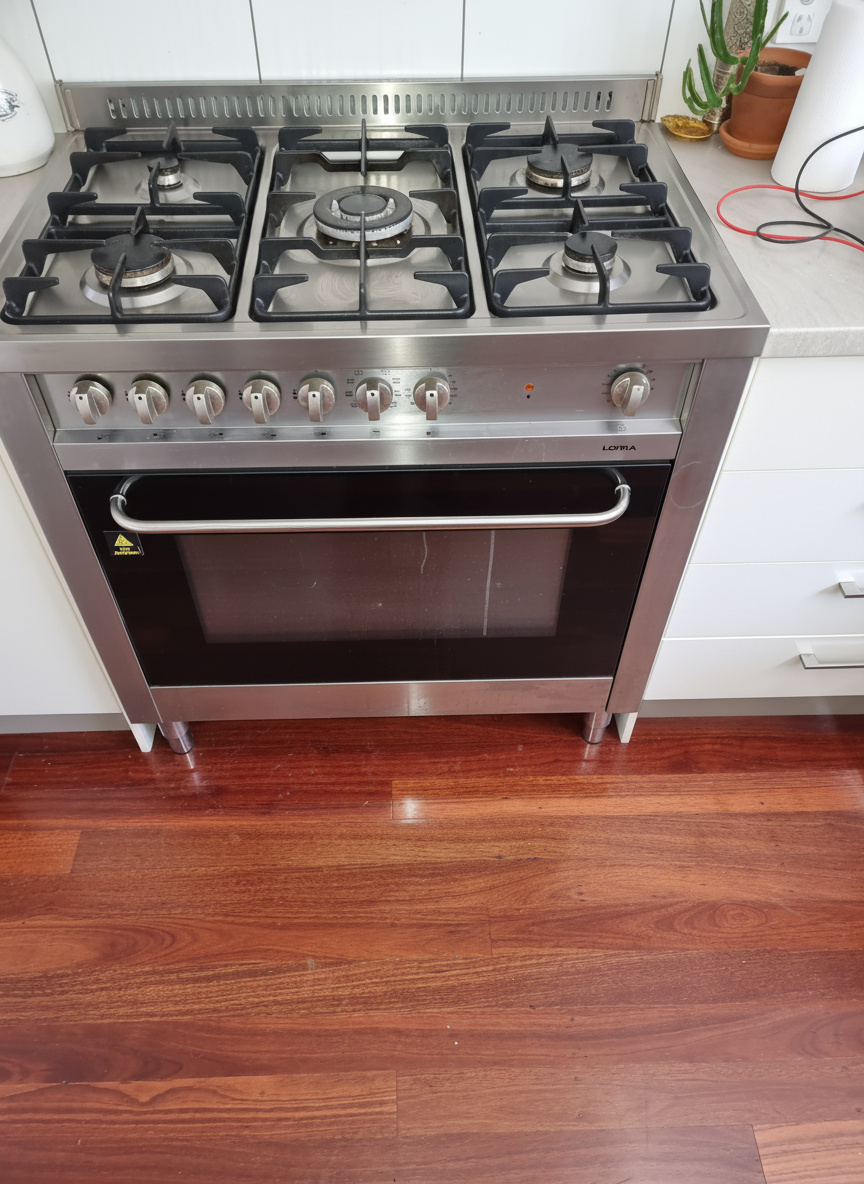 Technician repairing an appliance