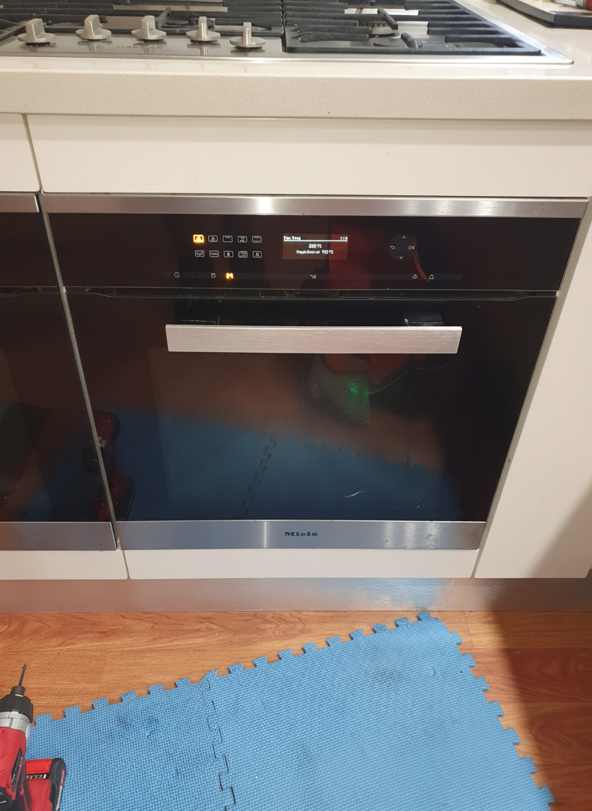 Technician repairing an appliance