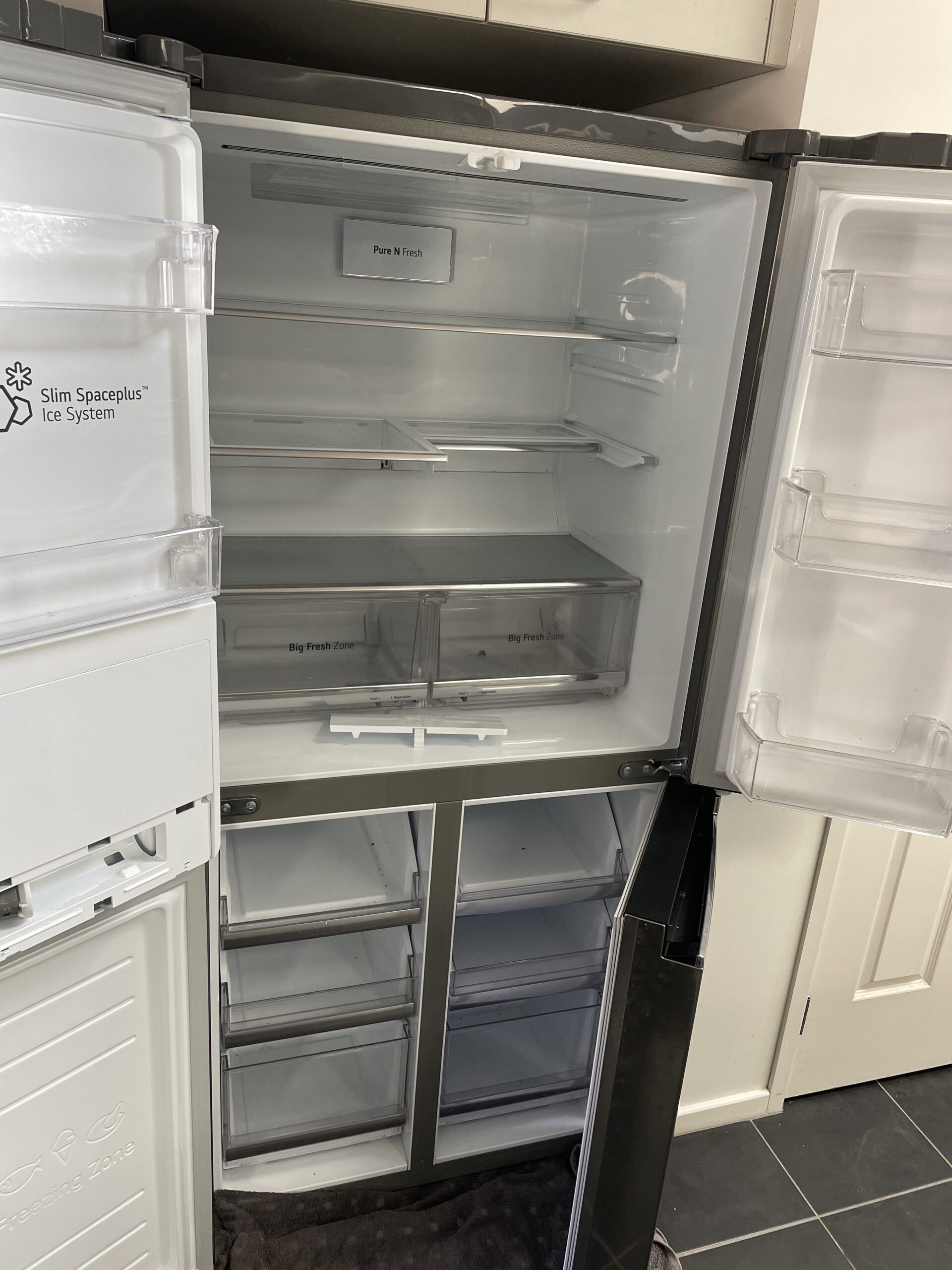 Technician repairing an appliance