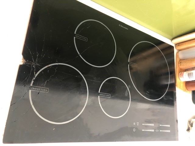 Technician repairing an appliance